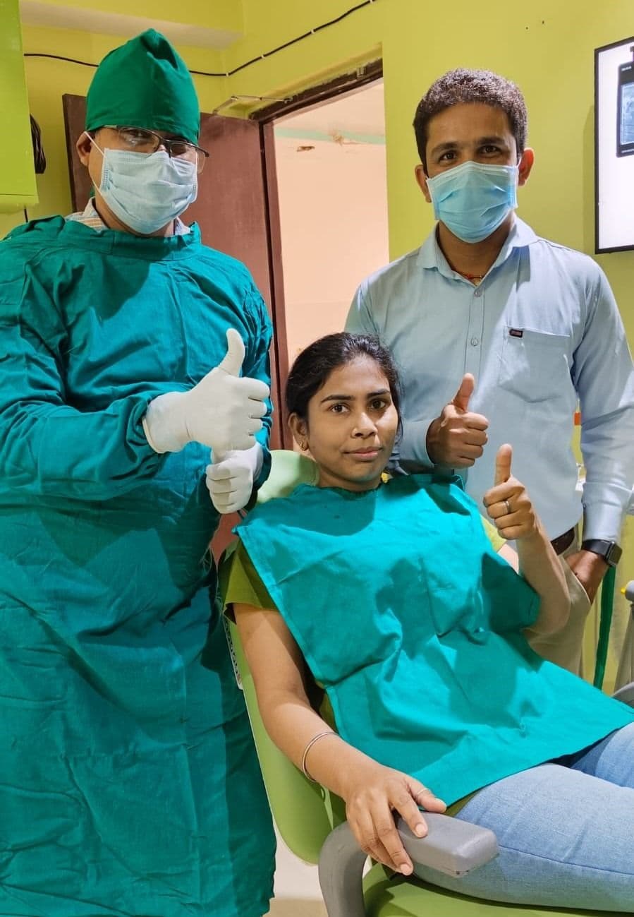Dr. Abhishek Kumar - Happy patient after implants placement.jpeg