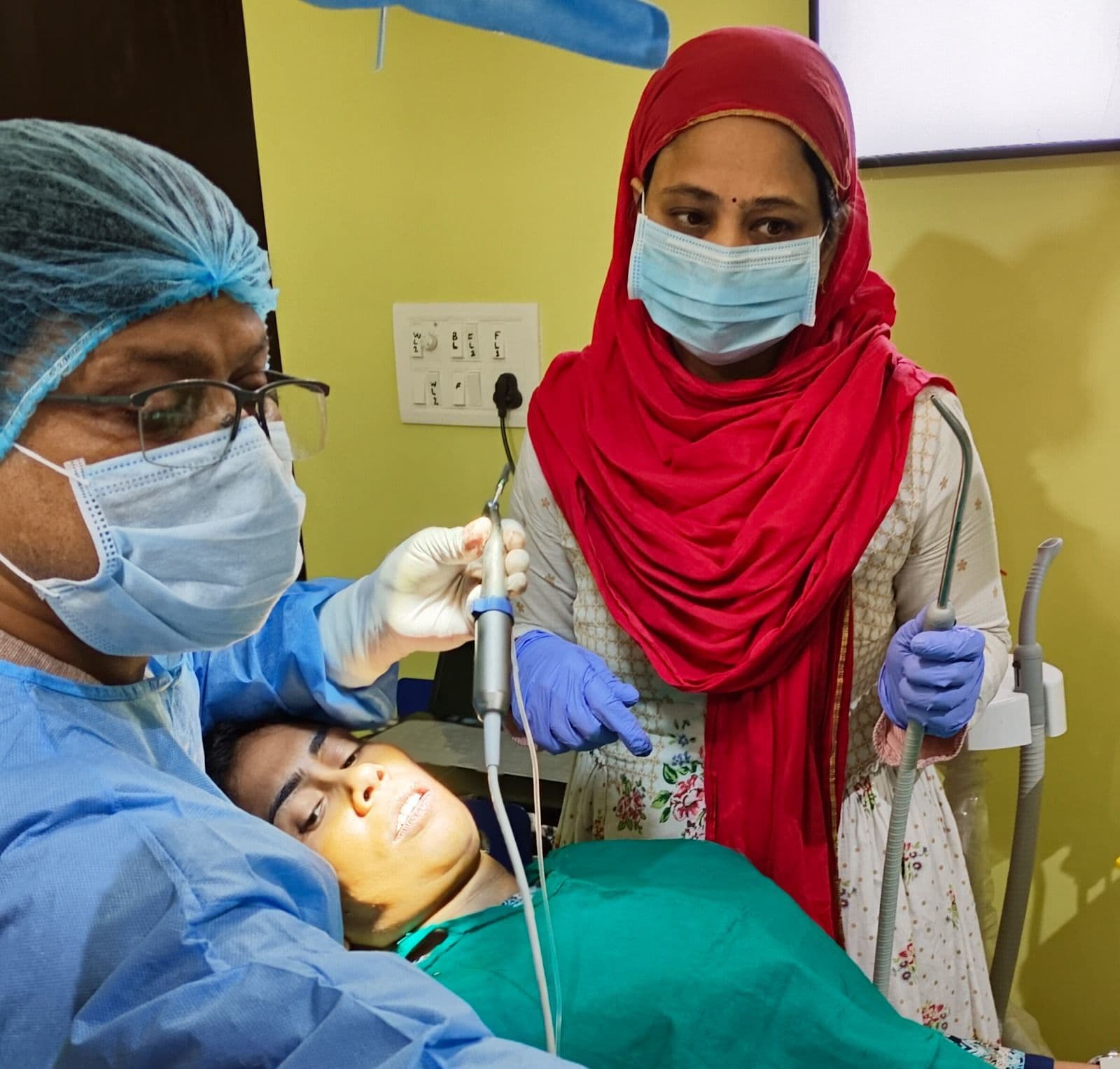 Dr. Archana Rani Placing Implants at Magadh Oro Dental.jpeg